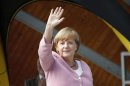 German Chancellor Angela Merkel waves during a Christian Democratic Union (CDU) election campaign rally in Heringsdorf at the Baltic sea July 22, 2013. REUTERS/Fabrizio Bensch