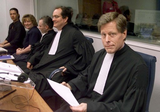 Mark Harmon (R), a then-prosecutor at the International War Crimes Tribunal in The Hague in 2000