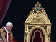 Pope Benedict XVI arrives to deliver his traditional Christmas "Urbi et Orbi" blessing from the balcony of St. Peter's Basilica in the Vatican on December 25. The pope called for an "end to the bloodshed" and "a political solution" in conflict-wracked Syria in a traditional Christmas message that touched on several other of the world's conflict zones