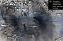 Smoke is seen in this satellite image of the city of Mosul in Iraq