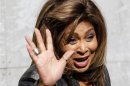 U.S. pop singer Tina Turner waves during photocall before the Emporio Armani Autumn/Winter 2011 women's collection show at Milan Fashion Week