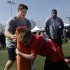 NFL draft prospects Luke Joeckel of Texas A&M, left, and Menelik Watson of Florida State participate in a youth football clinic in New York,Wednesday, April 24, 2013. (AP Photo/Seth Wenig)