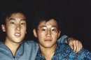 FILE - This 1988 file photo provided by Bobby Lee shows Kenneth Bae, right, and Bobby Lee together when they were freshmen students at the University of Oregon. North Korea says a Kenneth Bae, who was sentenced to 15 years' hard labour, smuggled in unspecified inflammatory literature and tried to establish a base for anti-Pyongyang activities at a hotel in the border city of Rason. The statement late Thursday, May 9, 2013 from an unidentified Supreme Court spokesman, provides the most in-depth look so far of Pyongyang's allegations against Kenneth Bae. Analysts say Pyongyang may be using Bae as bait to gain direct talks with Washington. (AP Photo/The Register-Guard, Bobby Lee, File)