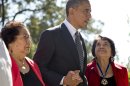 President Barack Obama walks with Cesar Chavez' widow Helen F. Chavez, left, and Dolores Huerta, Co-Founder of the United Farm Workers, as they tour the Cesar E. Chavez National Monument Memorial Garden, Monday, Oct. 8, 2012, in Keene, Calif. (AP Photo/Carolyn Kaster)