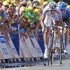 Stage winner Pierrick Fedrigo of France, left, and Christian Vandevelde of the US, right, sprint towards the finish line of the 15th stage of the Tour de France cycling race over 158.5 kilometers (98.5 miles) with start in Samatan and finish in Pau, France, Monday July 16, 2012. (AP Photo/Laurent Cipriani)
