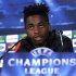 Barcelona's Alex Song answers a question during a press conference ahead of their Champions League soccer match against Celtic in Glasgow, Scotland