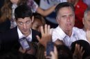 Republican presidential candidate, former Massachusetts Gov. Mitt Romney, right, and his newly announced vice presidential running mate, Rep. Paul Ryan, R-Wis., left, greet supporters during a campaign rally in Manassas, Va., Saturday, Aug. 11, 2012. (AP Photo/Pablo Martinez Monsivais)