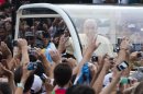 Photos: Pope Francis a big hit in Brazil, but protests continue