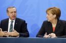 German Chancellor Merkel and Turkey's Prime Minister Erdogan address the media after talks in Berlin