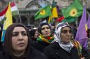 Demonstrators of Kurdish origin gather to protest after the killing of three Kurdish women activists in Paris, Saturday, Jan. 12, 2013. (AP Photo/Thibault Camus)