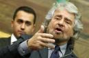 Leader of the 5-Star movement and comedian Beppe Grillo talks to reporters at the end of consultations with Italian Prime Minister-designate Matteo Renzi at the Parliament in Rome