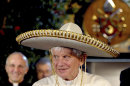 FILE -- In this file picture made available on March 26, 2012 by the Vatican newspaper Osservatore Romano, Pope Benedict XVI wears a Mexican sombrero hat in Leon, Mexico, Sunday, March 25, 2012. Turin's La Stampa newspaper reported Thursday, Feb. 14, 2014, that Benedict hit his head and bled when he got up in the middle of the night in an unfamiliar bedroom in Leon, Mexico. The report said blood stained his hair, pillow and floor. Vatican spokesman the Rev. Federico Lombardi confirmed the incident but said "it was not relevant for the trip, in that it didn't affect it, nor in the decision" to resign. (AP Photo/Osservatore Romano)