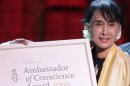 Myanmar democracy icon Aung San Suu Kyi accepts the Ambassador of Conscience Award 2009 in 2012