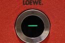 Control button of LOEWE television set is pictured at IFA consumer electronics fair in Berlin