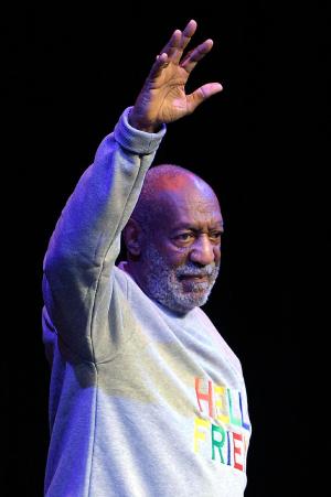 Comedian Bill Cosby waves to the crowd as he walks&nbsp;&hellip;