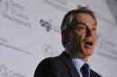 Employees at global charity Save the Children condemn decision to give former British PM Tony Blair an award