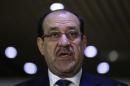 Iraqi Prime Minister Maliki speaks during a news conference in Baghdad