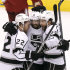 Los Angeles Kings' Trevor Lewis (22), Drew Doughty (8), and Jarret Stoll (28) celebrate a goal by Dwight King against the Phoenix Coyotes in the first period during Game 2 of the NHL hockey Stanley Cup Western Conference finals, Tuesday, May 15, 2012, in Glendale, Ariz. (AP Photo/Ross D. Franklin)