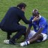 Italy's coach Prandelli comforts Balotelli after the game against Spain at the Euro 2012 final soccer match at the Olympic Stadium in Kiev