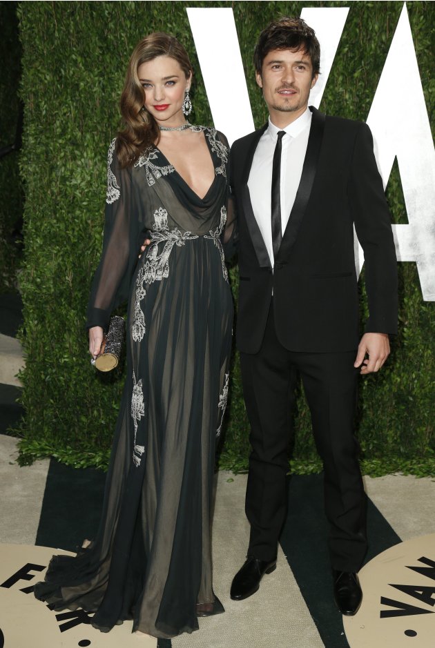 Actor Orlando Bloom and his wife, model Miranda Kerr arrive at the 2013 Vanity Fair Oscars Party in West Hollywood