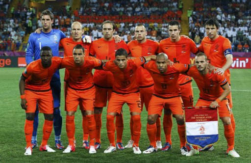 The Netherlands team pose before their Euro 2012 Group B soccer match against Germany at the Metalist stadium in Kharkiv