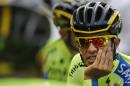 Spain's Alberto Contador talks to teammates when leaving for a training ride ahead of the Tour de France cycling race in Leeds, Britain, Friday, July 4, 2014. The Tour de France will start on Saturday July 5 in Leeds, and finishes in Paris on Sunday July 27. (AP Photo/Christophe Ena)