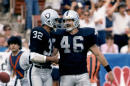 FILE - This Nov. 16, 1986 photo provided by the NFL shows Los Angeles Raiders tight end Todd Christensen (46) being congratulated by Marcus Allen (32) after scoring on a 3-yard touchdown reception during the Raiders 27-14 victory over the Cleveland Browns in Los Angeles. Former Raiders tight end and five-time Pro Bowler Todd Christensen died from complications during liver transplant surgery. He was 57. Christensen's son, Toby Christensen, said his father passed away Wednesday morning, Nov. 13, 2013, at Intermountain Medical Center near his home in Alpine, Utah.  (AP Photo/NFL Photos)