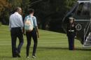 In this photo taken Aug. 19, 2014, President Barack Obama walks with his daughter Malia on the South Lawn of the White House in Washington toward Marine One. Malia is among the millions of U.S. high school seniors who are nervously taking standardized tests, completing college admissions applications, filling out financial aid forms and writing personal essays, all on deadline, before spending the coming months anxiously waiting to find out if they got into their dream school. (AP Photo/Charles Dharapak)