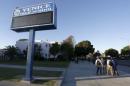 Students stand out front of Venice High School in Los Angeles