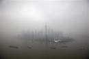 File picture shows the financial district of Pudong on a hazy day in Shanghai
