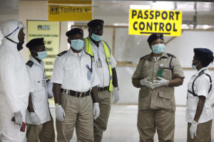 Nigeria health officials wait to screen passengers&nbsp;&hellip;