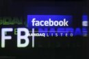 Facebook logo is seen on a screen inside at the Nasdaq Marketsite in New York