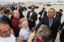 U.S. President Obama greets well-wishers upon his arrival in Buffalo