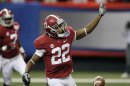 Alabama wide receiver Christion Jones (22) reacts after scoring on a punt return against Virginia Tech in the first half of an NCAA college football game, Saturday, Aug. 31, 2013, in Atlanta. (AP Photo/Dave Martin)