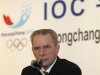 International Olympic Committee President Jacques Rogge answers a reporter's question at a news conference in Seoul