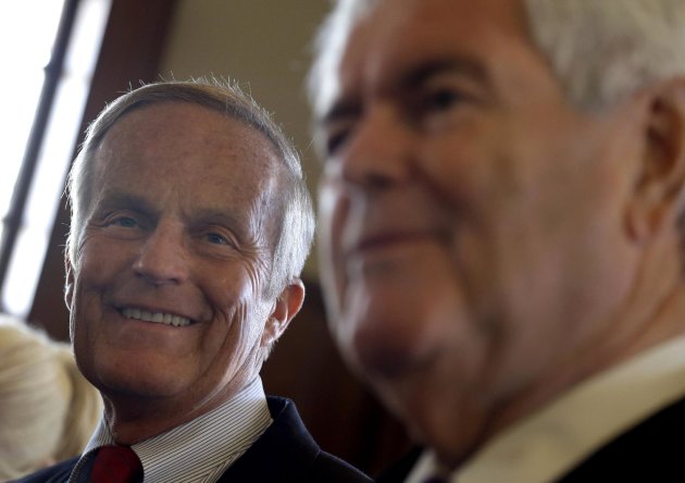 Missouri Republican Senate candidate, Rep. Todd Akin, R-Mo., smiles at left as former House Speaker Newt Gingrich speaks during news conference, Monday, Sept. 24, 2012, in Kirkwood, Mo. Akin is seeking to unseat incumbent Sen. Claire McCaskill, D-Mo. in the November election. (AP Photo/Jeff Roberson)