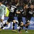 Juventus' Marchisio celebrates with his team mates Lichtsteiner and Vidal after scoring against Celtic during their Champions League soccer match at Celtic Park stadium in Glasgow, Scotland