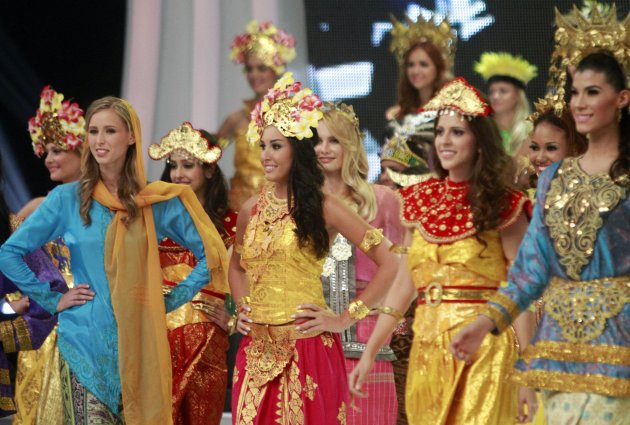 The 63rd Miss World Pageant contestants wear Indonesian's traditional dress during opening ceremony in Nusa Dua, Bali, Indonesia on Sunday, Sept. 8, 2013. (AP Photo/Firdia Lisnawati)