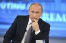Putin takes part in a live broadcast call-in in Moscow