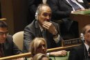 Ja'afari Syrian Ambassador to the United Nations listens as U.S. President Obama addresses 67th United Nations General Assembly at U.N. Headquarters in New York