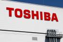 FILE PHOTO - The logo of Toshiba is pictured on its flash memory factory, seen during a media tour in Yokkaichi