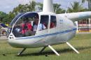 File photo - Then-local mayor of Davao city Rodrigo Duterte, aboard a helicopter, arrives at the provincial capitol in Tagum city, Davao del Norte, southern Philippines for the Regional Peace and Order Council meeting