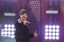 Singer Louis Tomlinson of the band One Direction performs on ABC's Good Morning America inside Central Park in New York