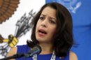 Kelly Keiderling talks to the media during a news conference at the U.S. embassy in Caracas