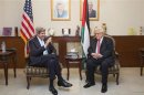 U.S. Secretary of State Kerry speaks with Palestinian President Abbas in Amman
