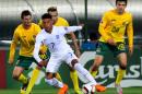 England's Alex Oxlade-Chamberlain (C) takes the ball during a Euro 2016 Group E qualifying football match against Lithuania at LFF stadium in Vilnius on October 12, 2015
