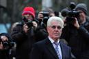 British publicist Max Clifford arrives at Southwark Crown Court in London, on March 5, 2014