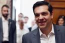 Prime Minister Alexis Tsipras arrives for his party's parliamentary group meeting at the Greek parliament in Athens on July 15, 2015