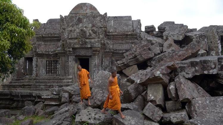 Cambodian Buddhist monks walk at Preah Vihear temple near the Cambodia-Thailand border in Preah Vihear province, some 400 kilometers north of Phnom Penh, on November 10, 2013