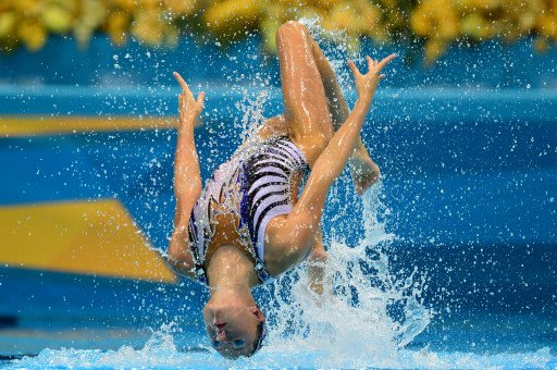 أفضل وأبرز صور اليوم الثاني عشر من الأولمبياد 000-DV1271383-jpg_211829